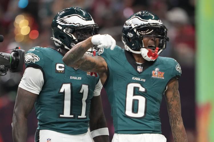 Philadelphia Eagles wide receiver DeVonta Smith (6) celebrates after catching a touchdown pass during the second half of the NFL Super Bowl 59 football game against the Kansas City Chiefs, Sunday, Feb. 9, 2025, in New Orleans. (AP Photo/Doug Benc)