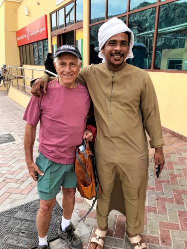 Gerard Simonette is shown with bus driver Hammad, the driver on his journey to and from the United Arab Emirates and Oman.