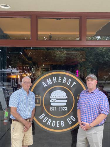 Amherst Burger Co. owner Barry Roberts, left, with Tony Ferrari, the ice cream and burger restaurant’s new chef/manager. The restaurant will close Tuesday, with plans to reopen in the new year under new ownership. 