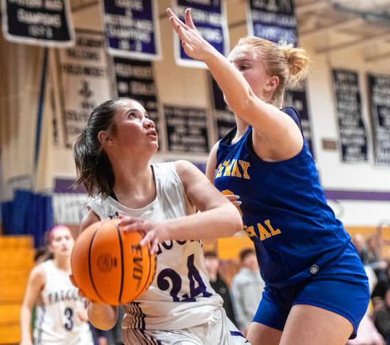 Smith Academy’s Jane Lavallee (24) attempts a shot past Gateway Regional’s Grace Renauld, right, on Thursday in Hatfield.
