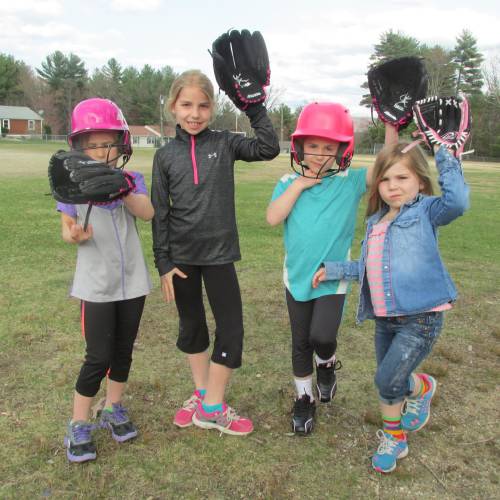 From left to right: Raegan Dubay, Josie Dubay, Ryanne Dubay, Kalin Dubay, posing for a picture in helmets and gloves during their early years.