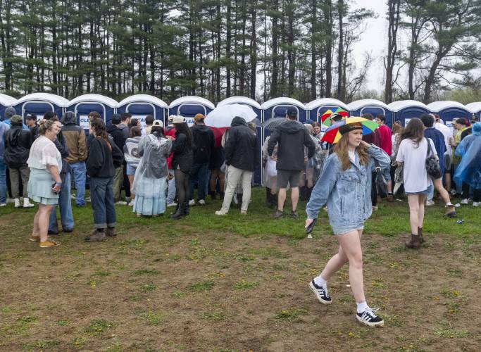 Festivalgoers lineup for a portable toilet during the second annual MojoFest at The Club, Saturday, April 26, 2025, in Hadley. Festivalgoers lineup for a portable toilet during the second annual MojoFest at The Club, Saturday, April 26, 2025, in Hadley.