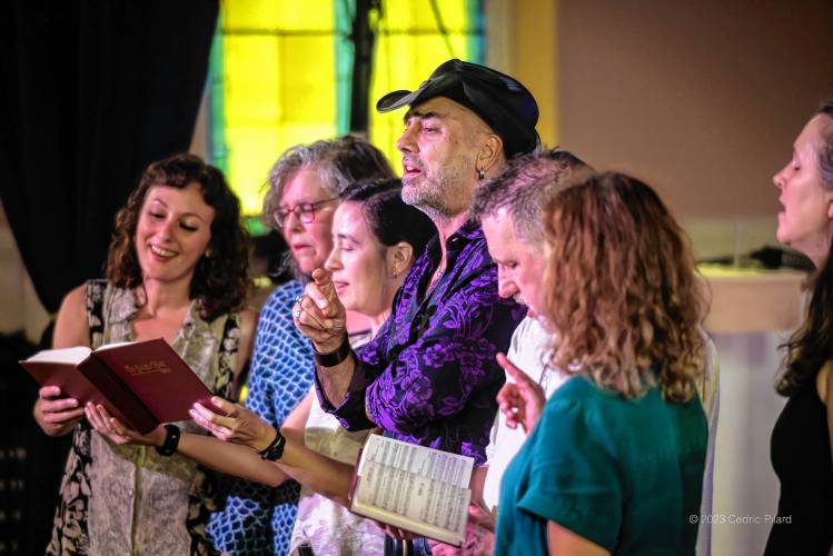 Tim Eriksen, in hat, joins singers at the Bombyx Center at a previous show. The Amherst musicologist has organized a Nov. 18 show there, inspired by an 1873 show in Florence.