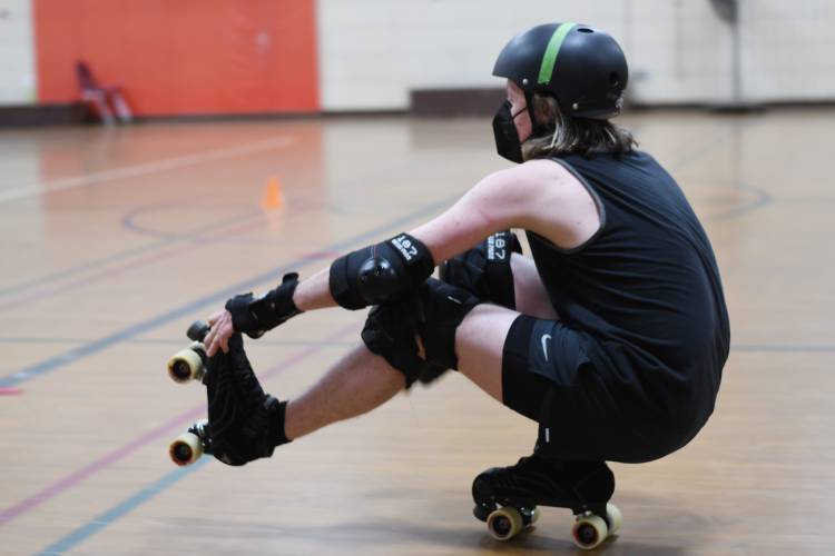 Goofing around during practice of the Pioneer Valley Roller Derby at Franklin Countys YMCA in Greenfield. 