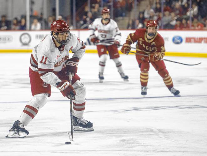 UMass center Lucas Mercuri (11) controls the puck during a game against Boston College at the Mullins Center, Saturday, Feb. 15, 2025, in Amherst. UMass center Lucas Mercuri (11) controls the puck during a game against Boston College at the Mullins Center, Saturday, Feb. 15, 2025, in Amherst.