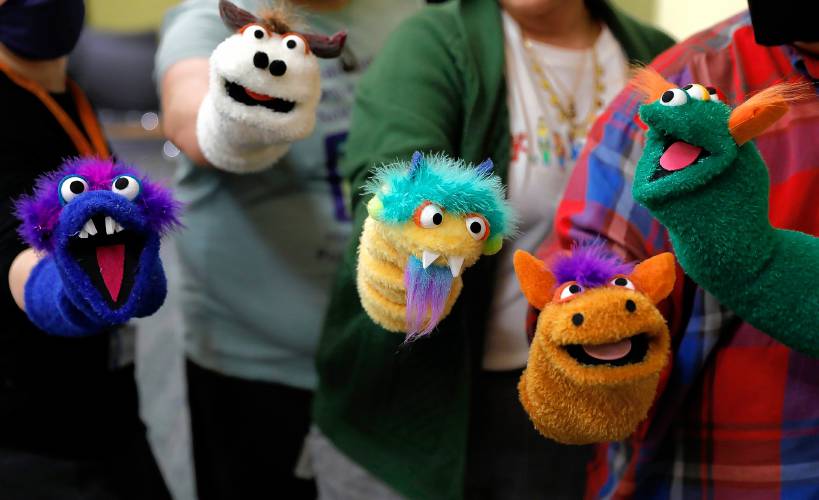 The finished puppets made during a deluxe sock puppet class by Homeslice Puppetry on Thursday night at the South Hadley Public Library. 