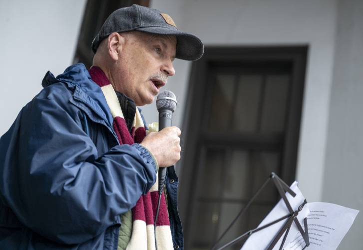 Harvard Professor Richard Tedlow speaks during a White Rose rally outside Northampton City Hall, Friday in Northampton.