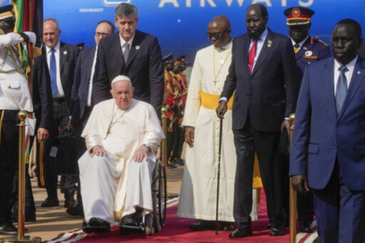 FILE - Pope Francis is welcomed by South Sudan's President Salva Kiir, second from right, upon his arrival at Juba's airport, South Sudan, Friday, Feb. 3, 2023. (AP Photo/Gregorio Borgia, File)