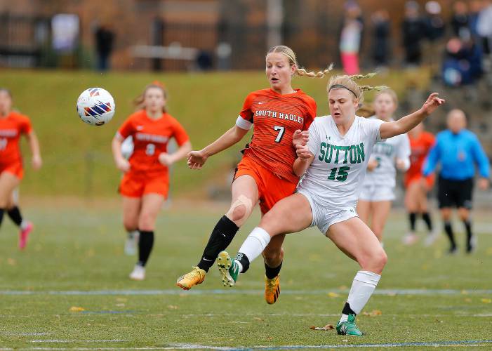 South Hadley’s Lauren Marjanski (7), left, fights for possession against Sutton defender Molly Jenkins (15) in the first half of the MIAA Division 4 girls soccer championship Saturday at Doyle Field in Leominster.