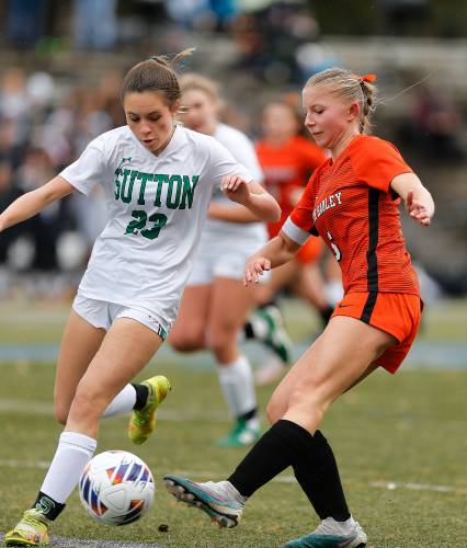 South Hadley’s Allison Fleury takes a shot past Sutton defender Hannah Pratt (23) in the second half of the MIAA Division 4 girls soccer championship Saturday at Doyle Field in Leominster.