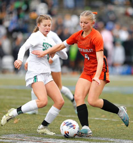 South Hadley’s Allison Fleury (6), right, vies for possession against Sutton defender Courtney Clemens in the second half of the MIAA Division 4 girls soccer championship Saturday at Doyle Field in Leominster.
