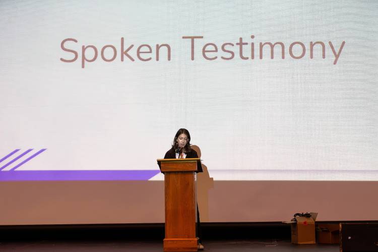 Haliyah Friedman-Kassis speaks during an AFAB and Female Identifying Youth Hearing held by the Northampton Youth Commission on Friday night at the Northampton High School Auditorium. 