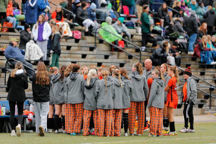 South Hadley huddles up during halftime against Sutton in the MIAA Division 4 girls soccer championship Saturday at Doyle Field in Leominster.