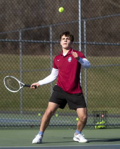 Amherst Regional's Alex Pobezinskiy tracks the ball during the high school tennis match against Belchertown at Amherst Regional Middle School, Tuesday, April 1, 2025, in Amherst.