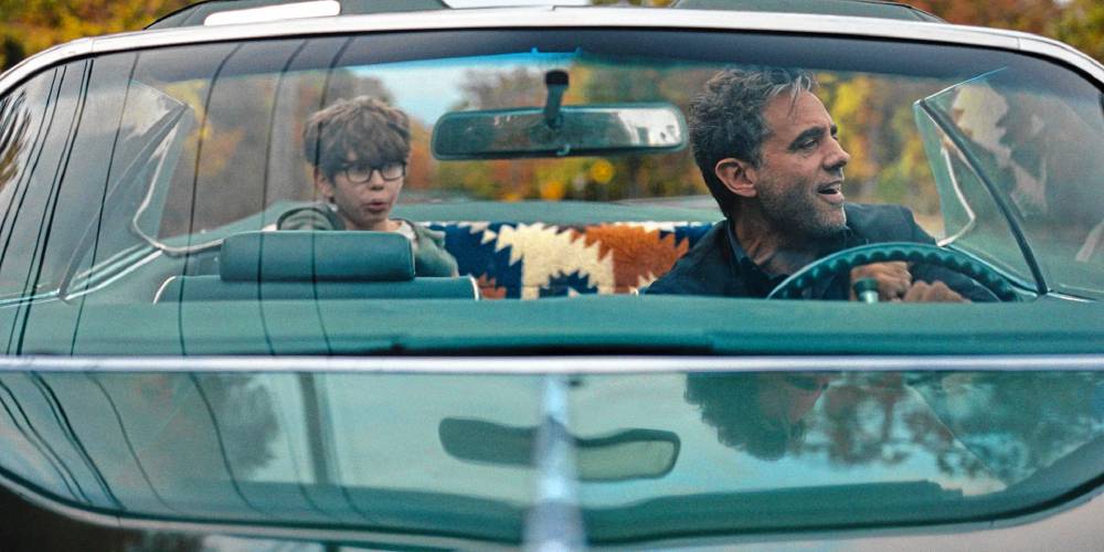 William A. Fitzgerald, left, plays Ezra, an autistic eleven year old, and Bobby Cannavale plays his father, Max, in “Ezra,” now playing at Amherst Cinema.